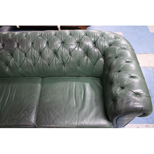 506 - A Large Two Seater Green Leather Effect Button Back Chesterfield Settee