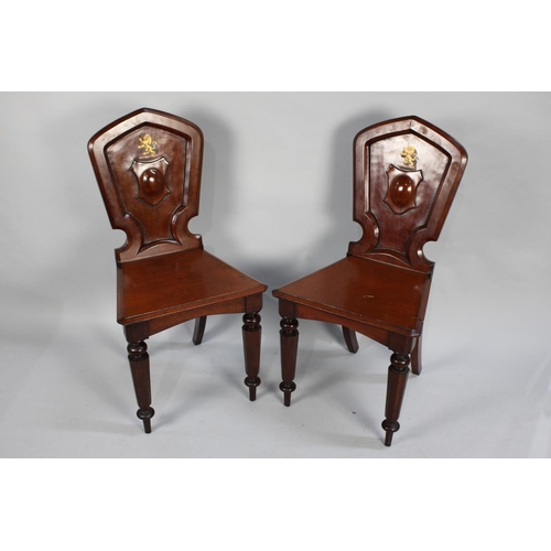 509 - A Pair of 19th Century Mahogany Hall Chairs, the Shield Backs with Painted Heraldic Lions on Turned ... 