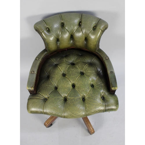 520 - A Late 20th Century Faux Leather Button Upholstered Desk Chair, Condition issues