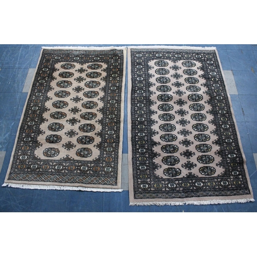 525 - Two Patterned Rugs, 156x97 and 143x93cms