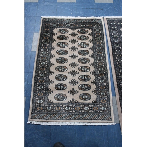 525 - Two Patterned Rugs, 156x97 and 143x93cms