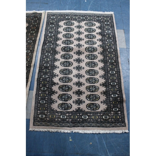 525 - Two Patterned Rugs, 156x97 and 143x93cms