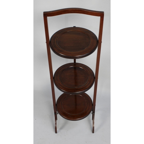 56 - An Edwardian Inlaid Mahogany Three Tier Cake Stand, 90cms High