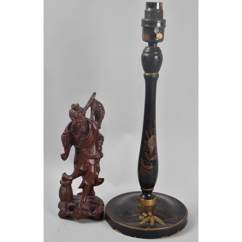 61 - A Laquered Wooden Chinoiserie Table Lamp and a Carved Wooden Chinese Figure of a Fisherman, Lamp 35c... 