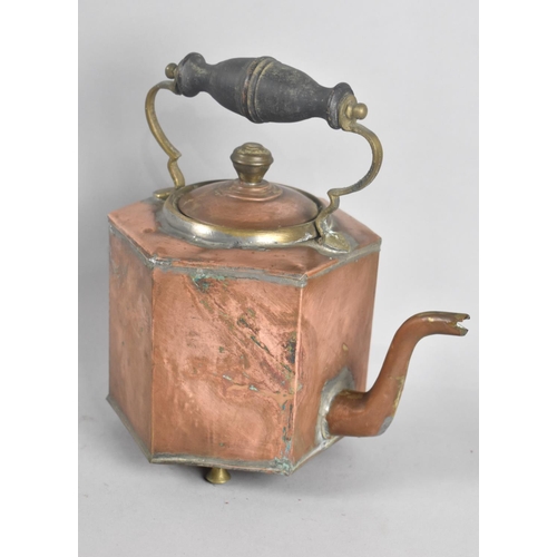 70 - A North African Copper Hexagonal Kettle with Turned Wooden Handle, 23cms High