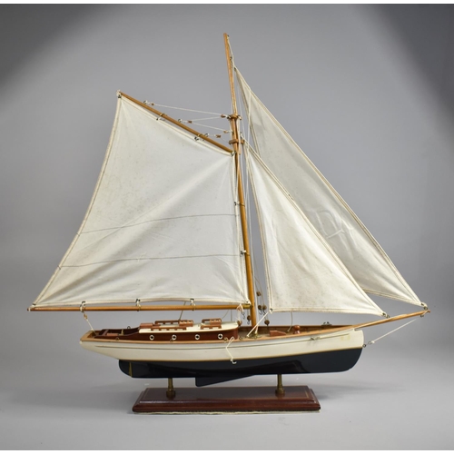 76 - A Nicely Made Table Top Model of a Sailing Boat, Fully Rigged and In Full Sail, 65cms Wide and 70cms... 