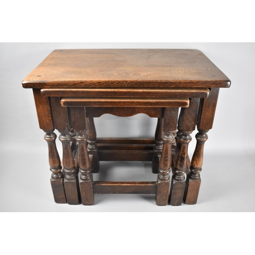 85 - A Mid 20th Century Oak Nest of Three Tables, 55cms Wide