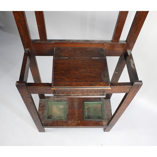 87 - An Edwardian Oak Narrow Hall Stand with Centre Glove Box Having Hinged Lid, Two Metal Drop Trays and... 