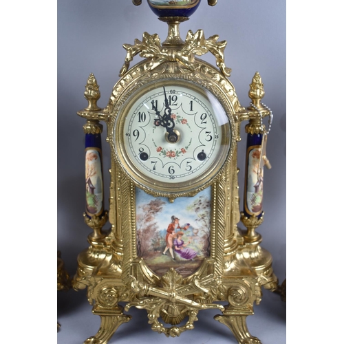 19 - A French Brass and Porcelain Clock Garniture in the Sevres Style, Hand Painted Lozenge Decoration to... 