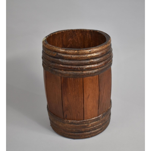 25 - A Mid 20th Century Cylindrical Stick Stand in Wood and Stripped Bark, 23cms Diameter and 33cms High