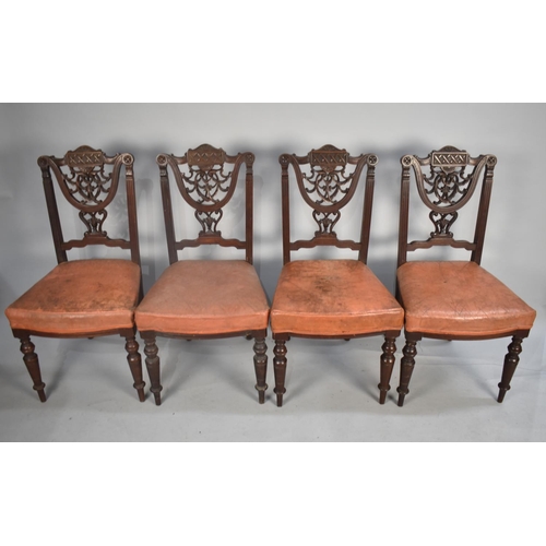 450 - A Set of Four Late Victorian/Edwardian Mahogany Framed Dining Chairs with Carved Backs