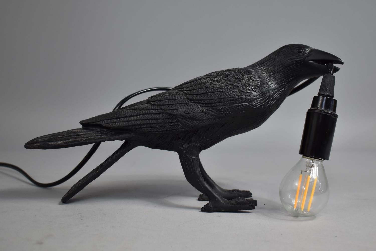 Crow holding deals light bulb lamp