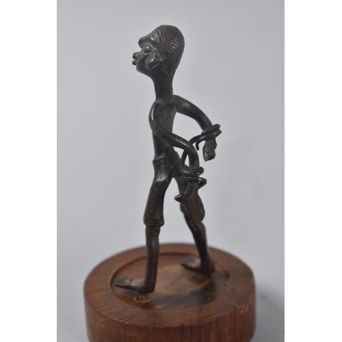 111 - A Vintage African Benin Bronze Figure Depicting Slave with Hands Tied Behind Back, Circular Wooden P... 