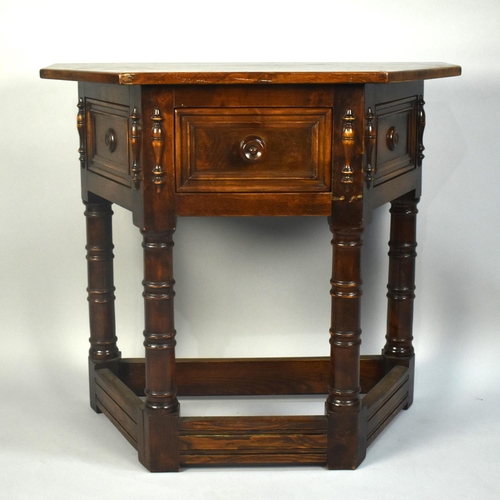 114 - A Mid 20th Century Credence Shaped Table with Turned Supports and Single Central Drawer