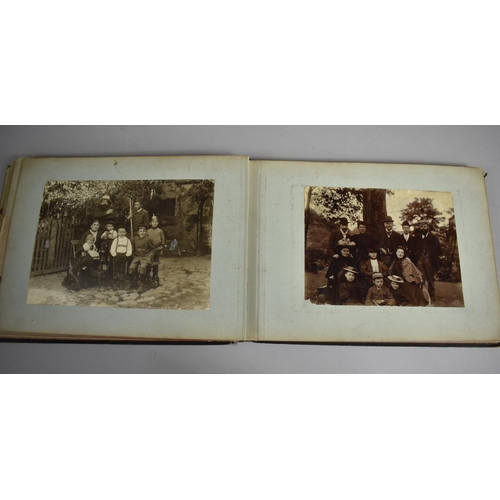 118 - A Late Victorian/Edwardian Photograph Album Detailing Family Pictures, Postcards Etc