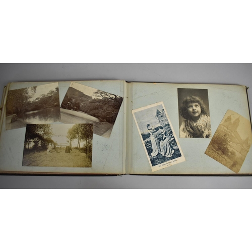 118 - A Late Victorian/Edwardian Photograph Album Detailing Family Pictures, Postcards Etc