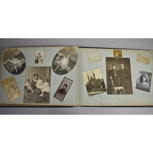 118 - A Late Victorian/Edwardian Photograph Album Detailing Family Pictures, Postcards Etc