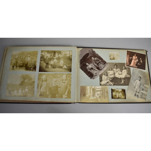 118 - A Late Victorian/Edwardian Photograph Album Detailing Family Pictures, Postcards Etc