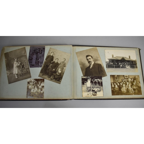 118 - A Late Victorian/Edwardian Photograph Album Detailing Family Pictures, Postcards Etc