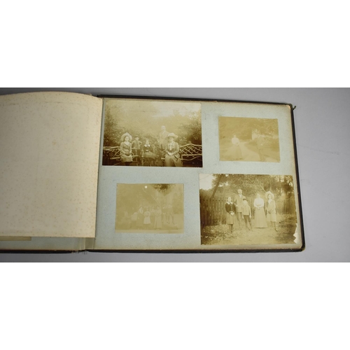 118 - A Late Victorian/Edwardian Photograph Album Detailing Family Pictures, Postcards Etc