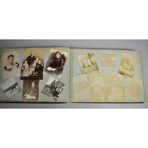 118 - A Late Victorian/Edwardian Photograph Album Detailing Family Pictures, Postcards Etc