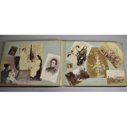 118 - A Late Victorian/Edwardian Photograph Album Detailing Family Pictures, Postcards Etc