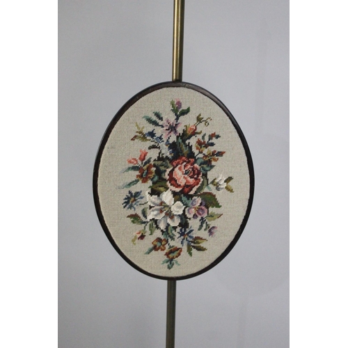 119 - A Late 19th century Mahogany and Brass Rise and Fall Pole Screen with Oval Panel having Floral Tapes... 