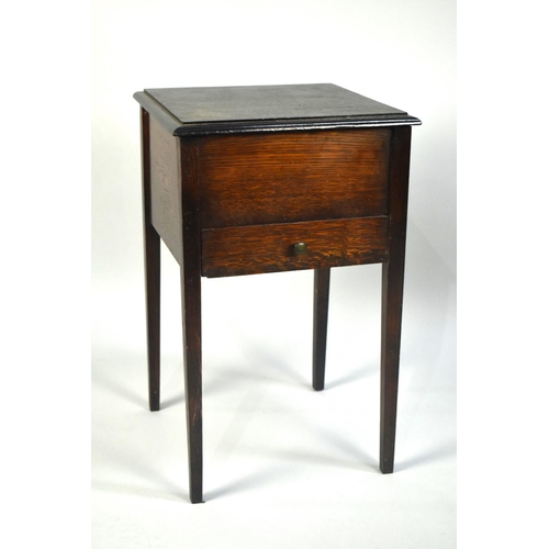 125 - An Edwardian Oak Lift Top Satin Lined Sewing Box with Base Drawer, 37.5cms Wide