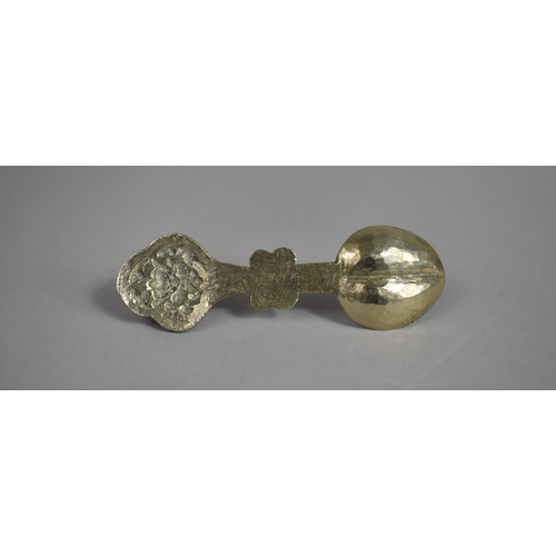 14 - A Far Eastern White Metal Anointing Spoon with Pale Blue Cabochon and Engraved and Relief Decoration... 