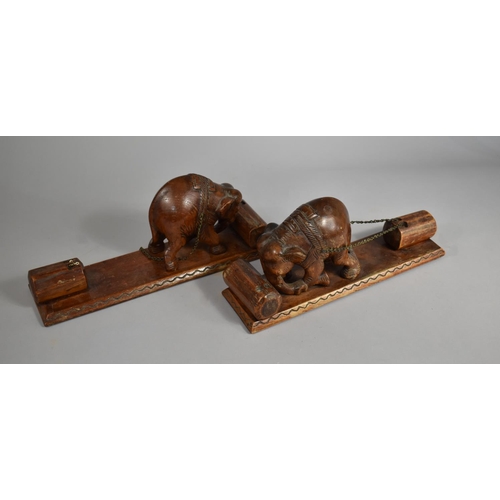 144 - A Pair of Carved Wooden Indian Book Ends in the Form of Elephants Pushing Tree Trunk Whilst Dragging... 