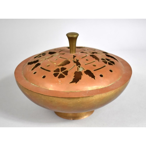 201 - A Circular Copper Censer with Pierced Lid, 23cms Diameter