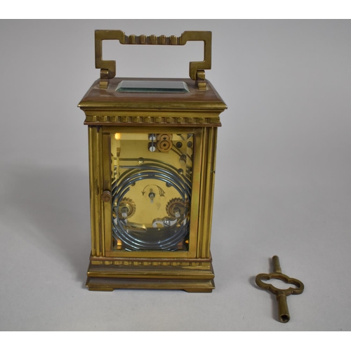 30 - An Early 20th Century Brass Cased Carriage Clock with White Enamelled Dial with Key but Movement Nee... 