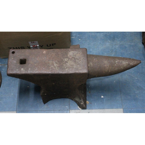 473 - A Large Cast Iron Blacksmith's Anvil, 65cm long