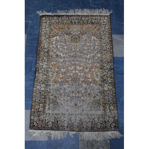 483 - A Patterned Rug, Worn, 141x88cms