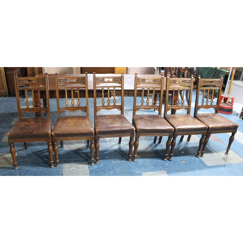 484 - A Set of Six Edwardian Carved Oak Leather Seated Dining Chairs