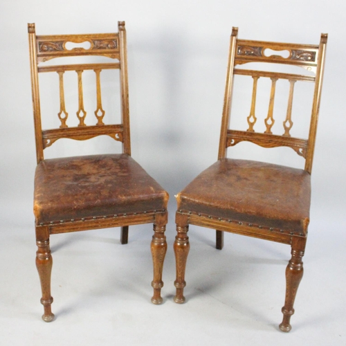 484 - A Set of Six Edwardian Carved Oak Leather Seated Dining Chairs