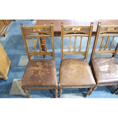 484 - A Set of Six Edwardian Carved Oak Leather Seated Dining Chairs