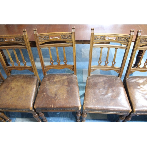 484 - A Set of Six Edwardian Carved Oak Leather Seated Dining Chairs