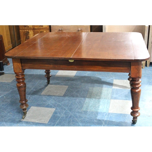 485 - A Late 19th Century Mahogany Pull Out Extending Dining table with Two Leaves, 230cms by 104cms