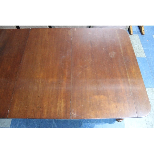 485 - A Late 19th Century Mahogany Pull Out Extending Dining table with Two Leaves, 230cms by 104cms