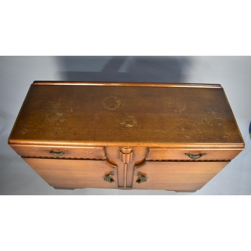 489 - A 1950s Oak Sideboard with two Drawers and Cupboard Base, Galleried Back, 172cms Wide