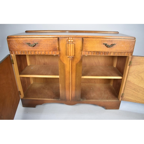 489 - A 1950s Oak Sideboard with two Drawers and Cupboard Base, Galleried Back, 172cms Wide