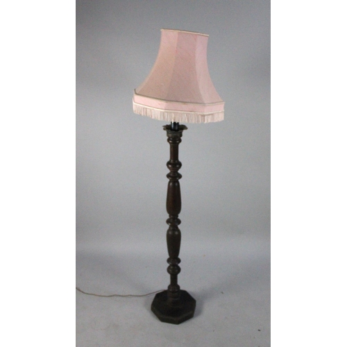 498 - A Vintage Turned Wooden Standard Lamp with Shade