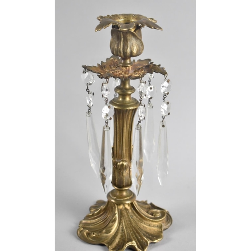 57 - An Edwardian Bronze Weighted Candlestick with Crystal Droppers, 23cms High