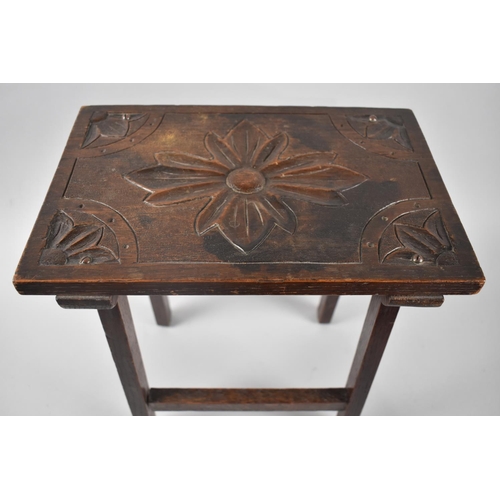 78 - An Edwardian Carved Oak Rectangular Stool, 34cms by 23cms