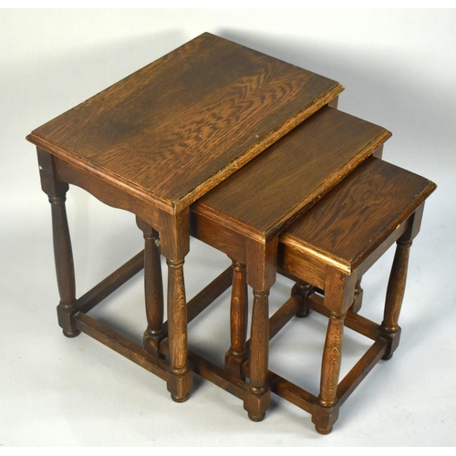 79 - A Mid 20th Century Oak Nest of Three Tables, 48cms wide