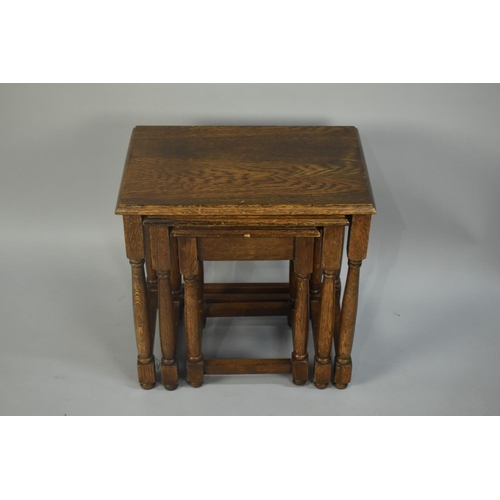 79 - A Mid 20th Century Oak Nest of Three Tables, 48cms wide