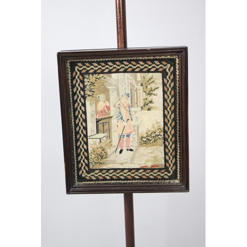 82 - A 19th Century Pole Screen on Triform Base having Rise and Fall Tapestry Panel