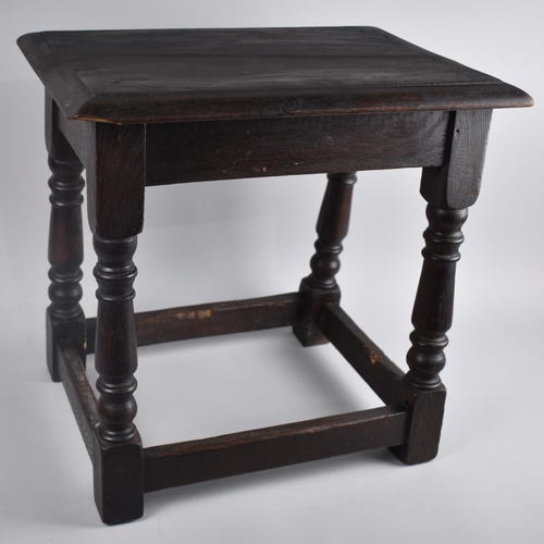 95 - A Stained Oak Rectangular Stool, 46cms Wide