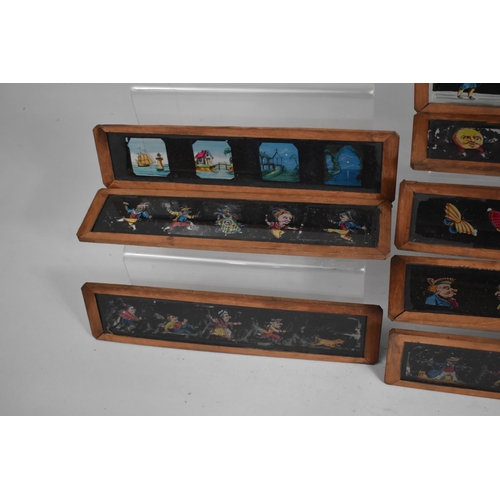 129 - A Vintage Wooden Box with Sliding Lid Containing Coloured Magic Lantern Strip Slides, 26cm Long